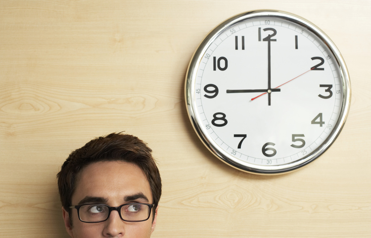 Business man watching clock