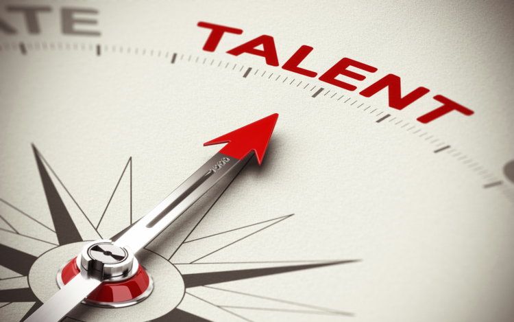 Compass arrow pointing toward talent