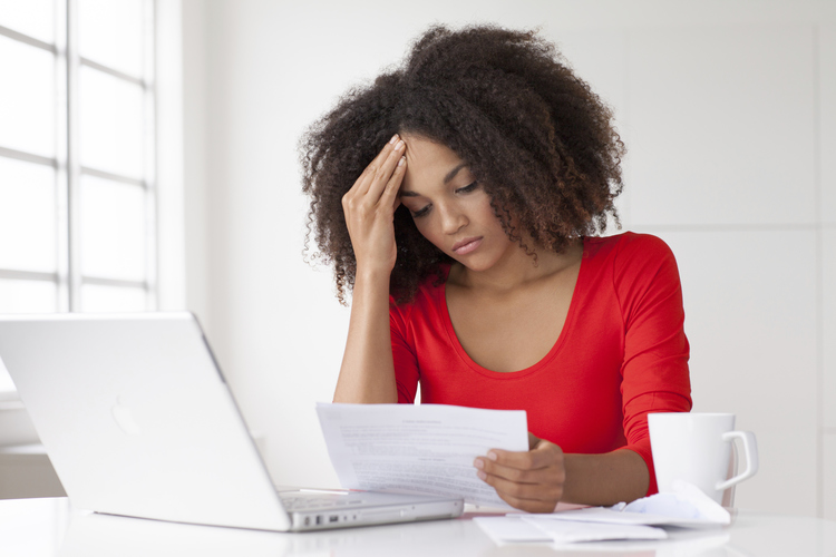 Female employee dealing with workplace anxiety.