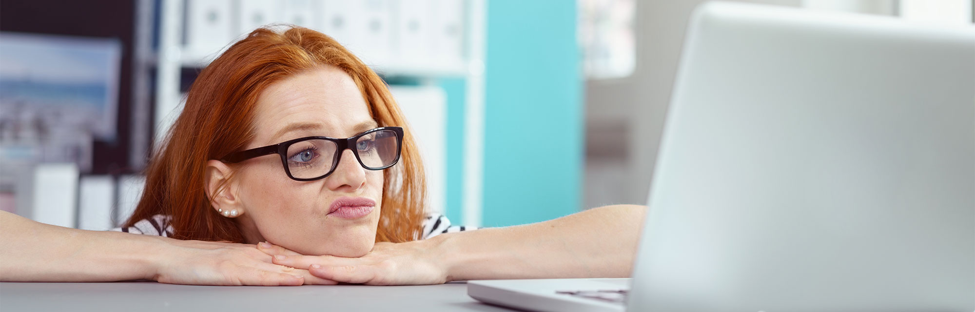 demoralized-employee photo of demoralized looking female employee